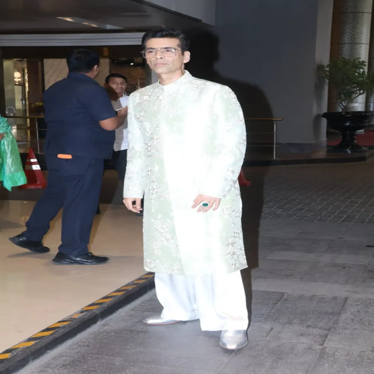 Filmmaker Karan Johar was also in attendance to extend warm wishes to the couple, cutting a striking figure in all white